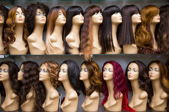various long wigs on display