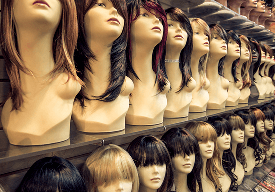 various wigs on display