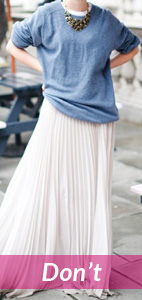 white flowing skirt and loose shirt