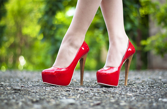 walking in red high heels