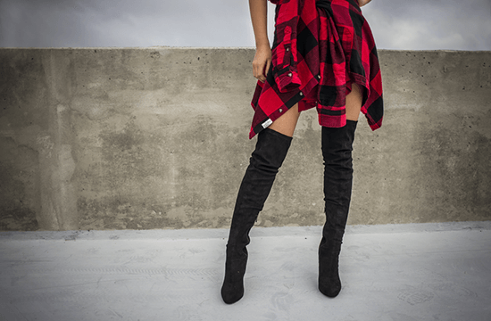 red plaid shirt and black boots