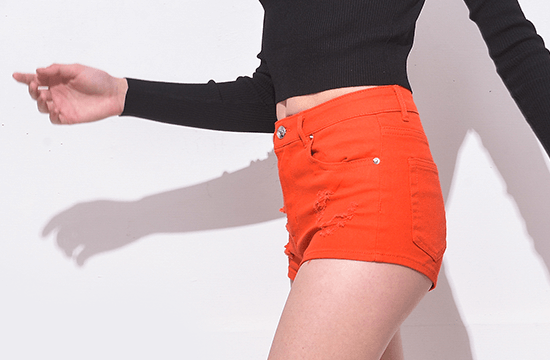 very short orange shorts